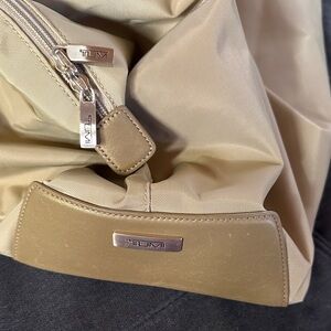 Tumi Gold Duffel Bag